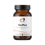 Bottle of NeuMag supplement with a white label on a white background