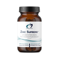 Bottle of Zinc Supreme supplement with a white label on a white background